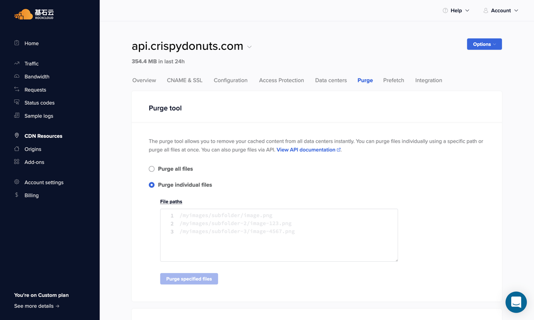 RockCloud control panel CDN resource view: the purge tool, used to clear every cached file at once or purge individual file paths, also callable over the API
